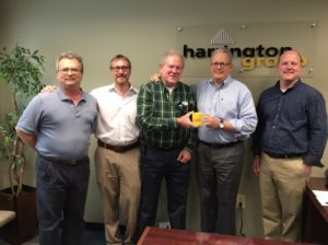 2016: Harrington Group’s Owners pose with firm friend, Sam Beale (center). Pictured left to right: Jim Rucci, Phil Friday, Sam Beale (S.M. Beale and Associates), Jeff Harrington, and Dale Hansen.